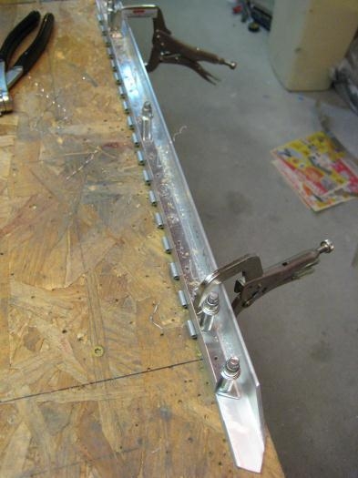 Entire -01 assembly clamped in place for drilling.