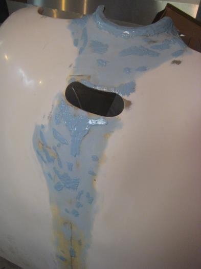 Dark spots are new filler in some low spots, and around the nose bowl that hadn't been filled before.