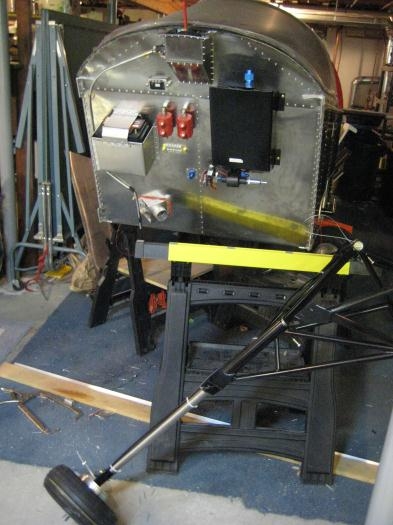 Engine mount detached for access to the firewall.