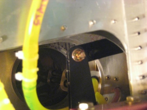 Pushrod attached to arm of flap tube.