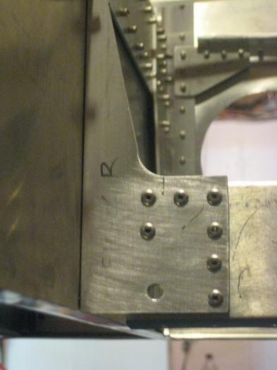 I re-riveted these two angles with the heads on the inside.