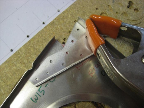 Align using the plans, clamp in place, then drill the first hole...