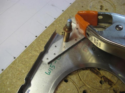 Then cleco the first hole, and drill all the rest.