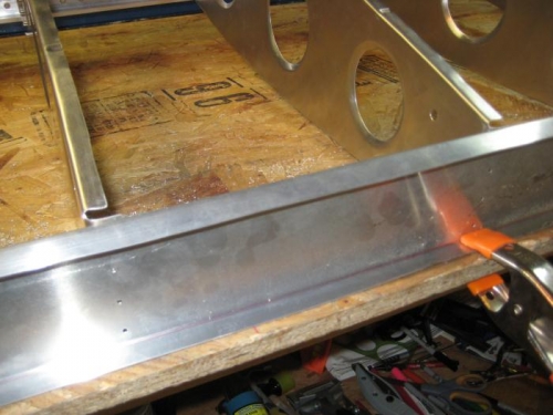 Closeup of rear spar with pilot holes, and ribs beyond.