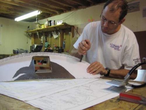 Hand bending the edge of the upper firewall