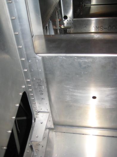 Pilot drilled for the forward tunnel Z (clecos already removed)