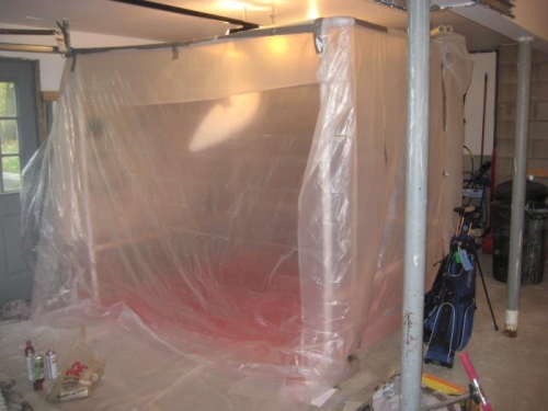 My paint booth, sealed with multiple layers of plastic.