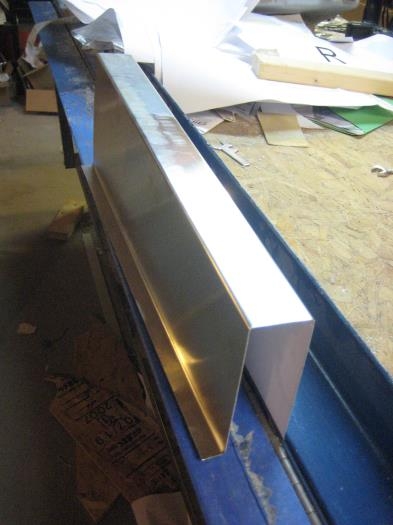 Bending the cover in the brake