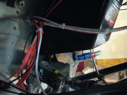 Adding more wire ties to keep things neat.