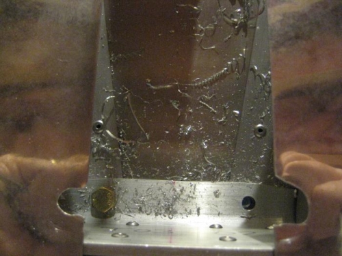 Notches in skins to allow access to drill aft holes.