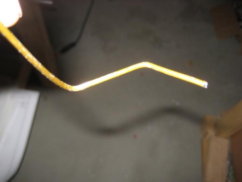 Coat hangar bent to fit