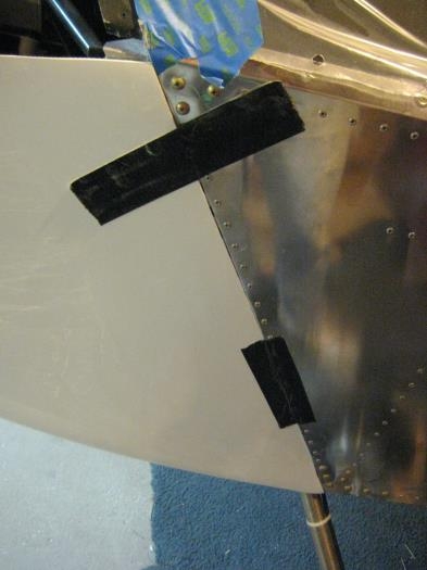 Left cowl in place with duct tape at fuselage