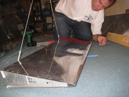 While holding the leading edge, put a 1/2