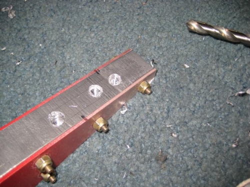 3 holes drilled in lead until balanced