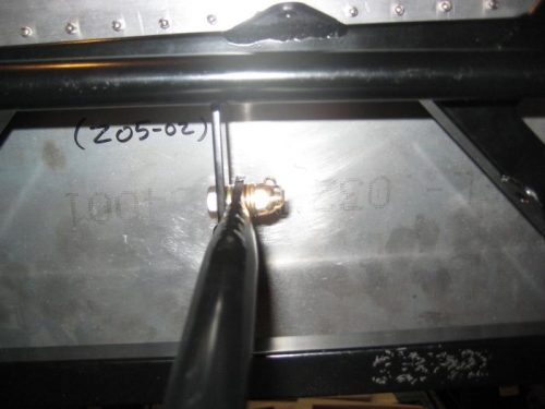 The connection of the control triangle to the elevator idler pushrod.