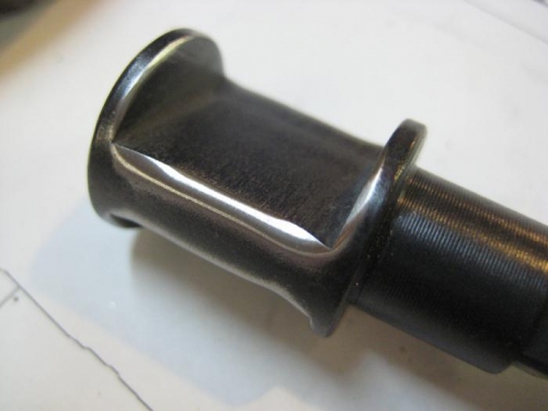 Brake cam with corners ground off.