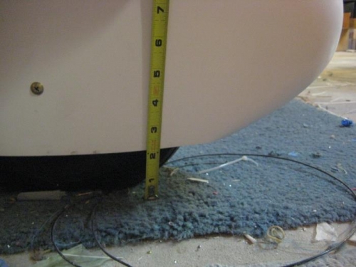 Measuring the front and rear of the wheel pant for level.