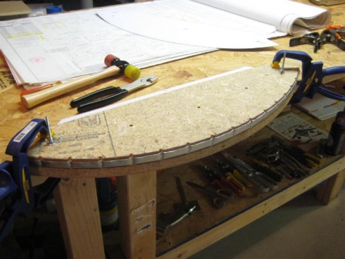 Initial bending of the bulkhead