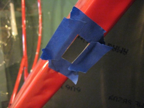 Tape to protect paint and define area to cut.