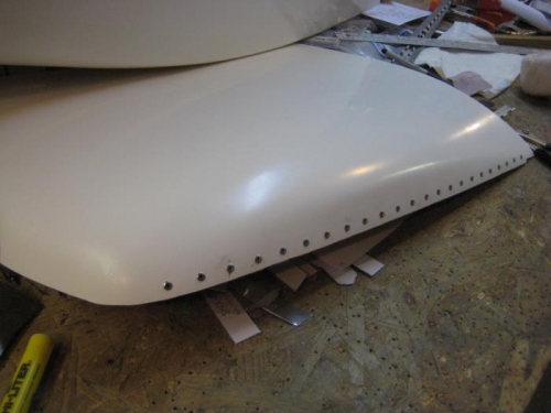 Upper left cowl with hinge attached.