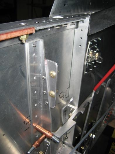 Added bracket, with fasteners to secure throttle.