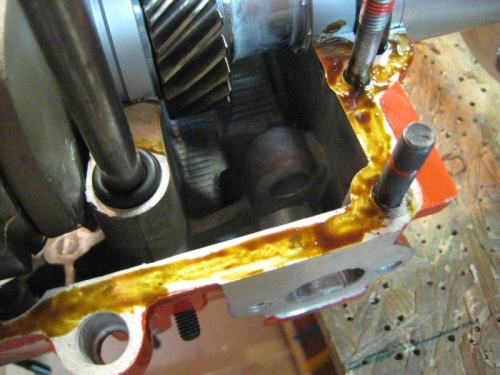 Permatex Form-a-Gasket thinly applied to the mating surfaces.