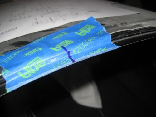 Mark at top center of windscreen and turtledeck.