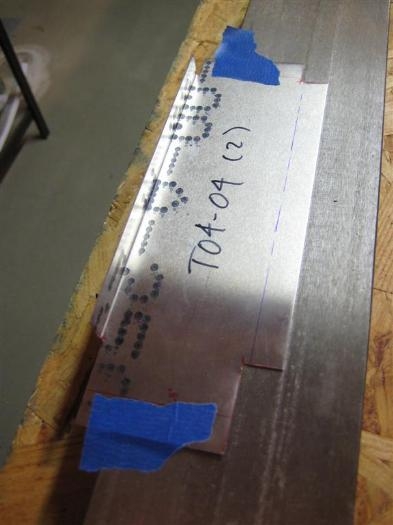 I use tape to hold the part in alignment so I can put the brake parts together without moving things.