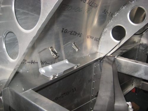 ELT shelf in 2nd bay behind passenger.