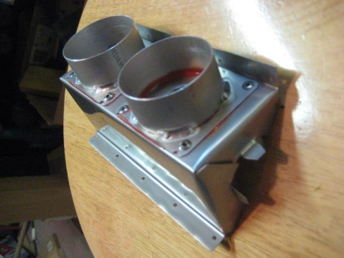 The other half made, with the in/out collars riveted in place.