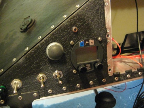 MGL V6 radio installed, with MP3 jack above.