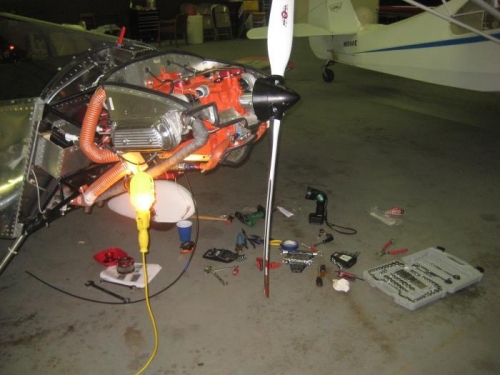 New black cable housing dangling.