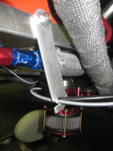 Alum arm to keep arc of cables, and keep them away from the exhaust pipe