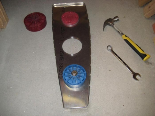 Using the flanging blocks. Screw down part way, then just whack it a few times around the perimeter.