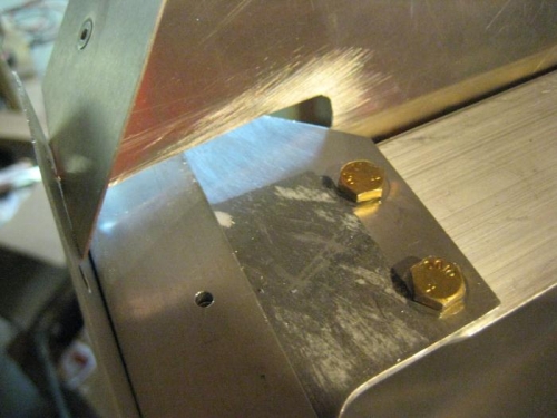 Bolts holding forward angle to upper engine mounts