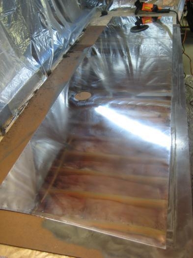 Wing skin. You can see the show surroundings reflecting.