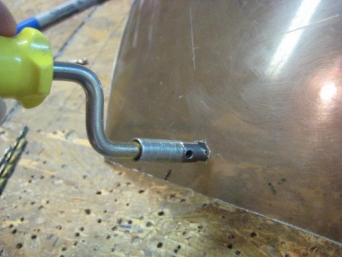 Cleaned both sides of the holes with the deburring tool, but also used it to countersink the outside.