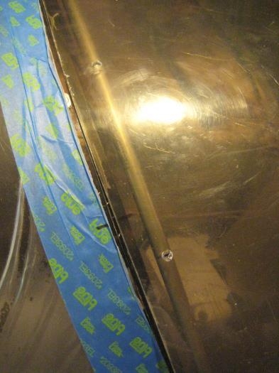 Canopy loosely laid back on the frame. See how the holes align with the canopy frame.