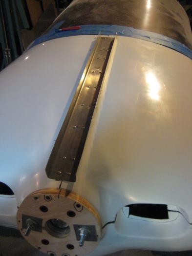 Channel riveted to upper cowl halves.