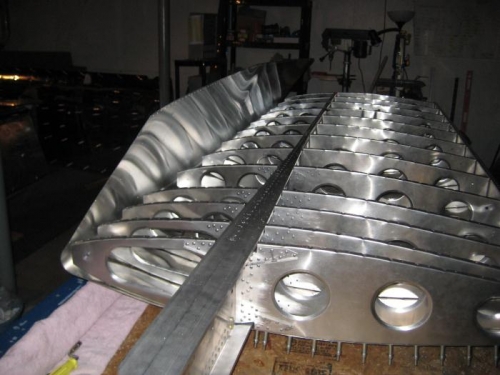 After drilling leading edge, starting to remove it for deburring & dimpling