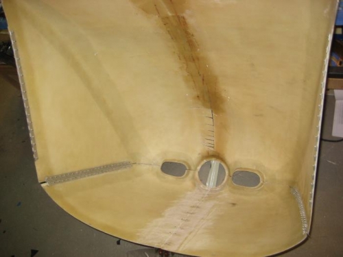 Roughed up the surfaces to be glassed.