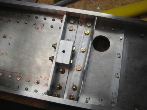 Angles and wing attach block with bolts and screws