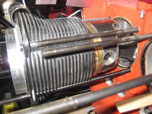 Rear cylinder with connecting rod pin in place, waiting for clip.