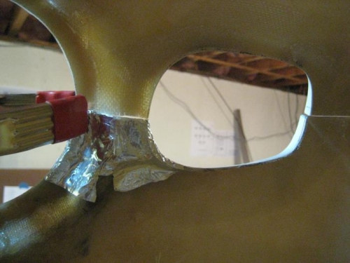 Aluminum tape, to prepare for fiberglass tabs.