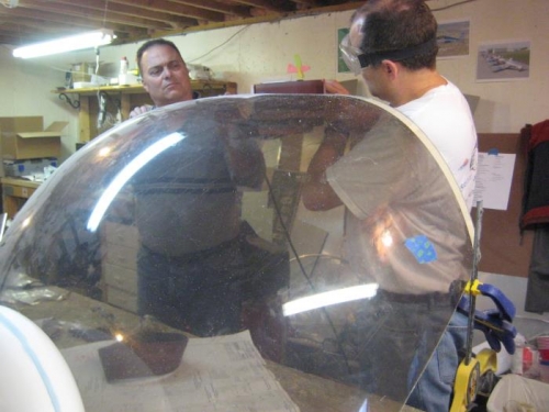 Using the belt sander to grind down close to the finished edges.