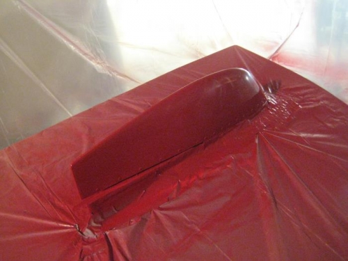 The painted vertical tail tip.