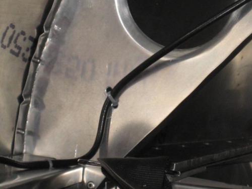 Holes and zip ties to hold antenna wire.