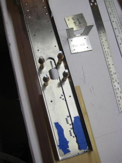 The lower channel (the correct one!) and strap aligned and drilled.