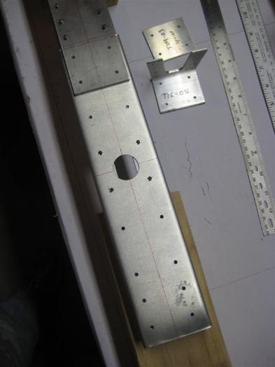 The back side of the same lower section. The angle T12-05 and spacer T09-03 are at the upper right.