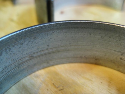 Crank bearing scored and pitted.